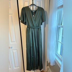Long silk green dress with tie back and leg slit